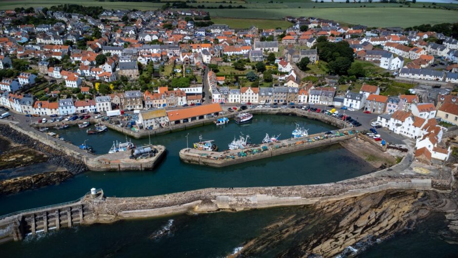 Bird's eye view of Pittenweem harbour where fishing industry has been hit by stormy weather. 