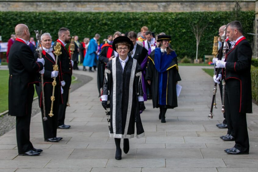 Dame Sally Mapstone leads students at a St Andrews University graduation ceremony on Wednesday. 
