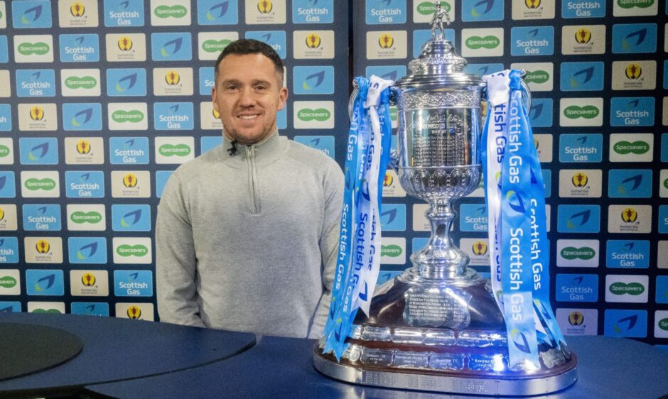 Former Dundee United hero Danny Swanson carries out the Scottish Cup draw