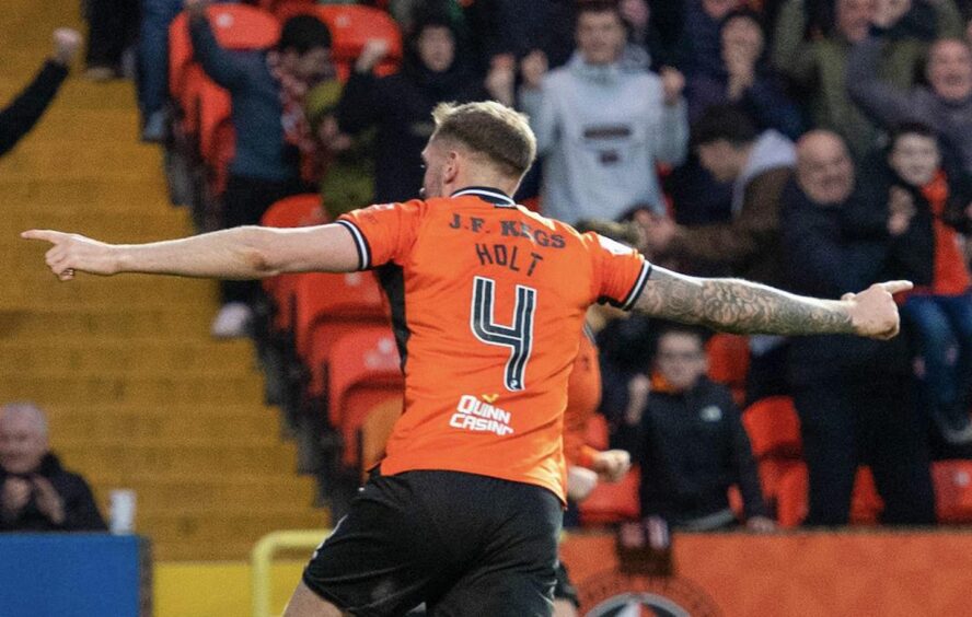 Dundee United's Kevin Holt celebrates his leveller against Inverness