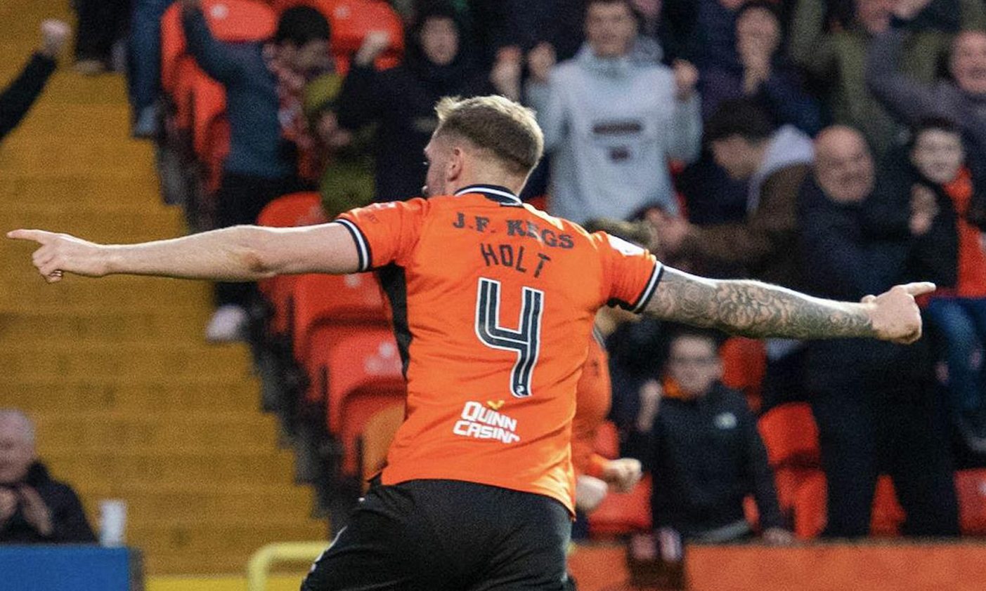 Dundee United's Kevin Holt celebrates his leveller against Inverness