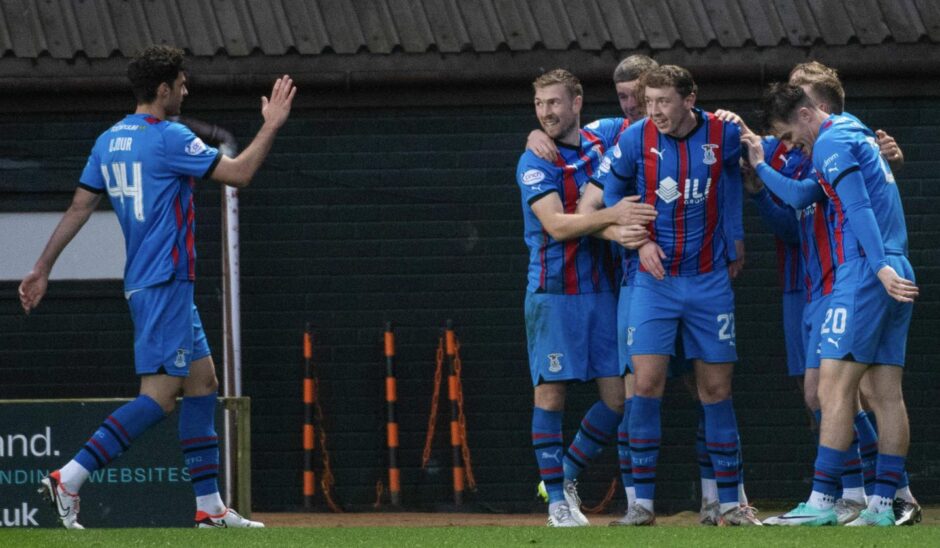 Nathan Shaw and Inverness players celebrate against Dundee United