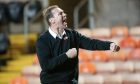 Ex Dundee United hero Duncan Ferguson hails the travelling Inverness fans at Tannadice