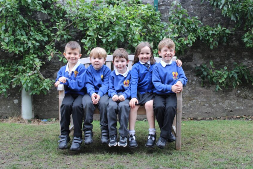 Strathmartine pupils posing for their first class photo.