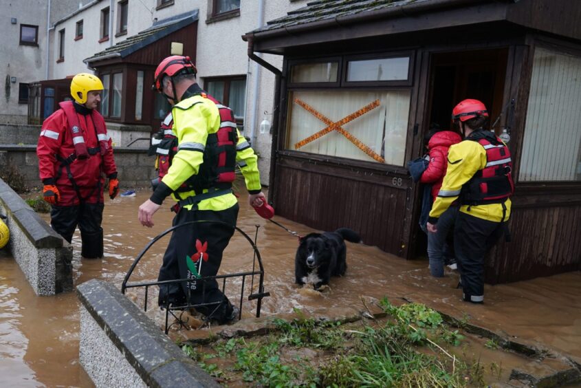 Families being rescued in Brechin during Storm Babet.