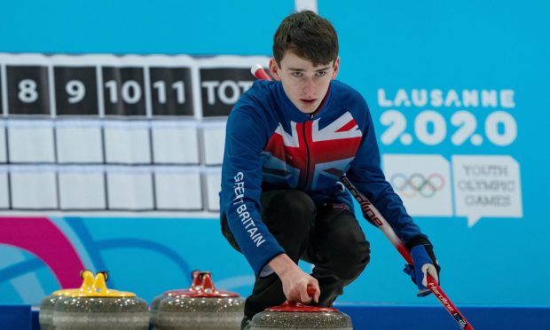 Ross Craik curling for Britain at the Winter Youth Olympics.