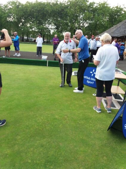 Alf receiving his ScottishDisability Sport B3 Singles gold medal at Kelvingrove, Glasgow