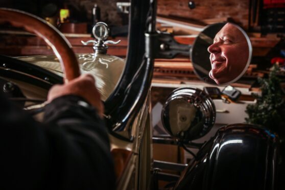 Brian Rennie at the wheel of the 1926 Buick. Image: Mhairi Edwards/DC Thomson