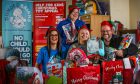 Dundee Bairns' Susan Maxwell (left) and Genna Millar (back) with Stacey Wallace and Derek Miller of Help For Kids. Image: Mhairi Edwards/DC Thomson.