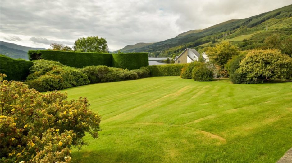 The well-maintained garden of the home in Fearnan.