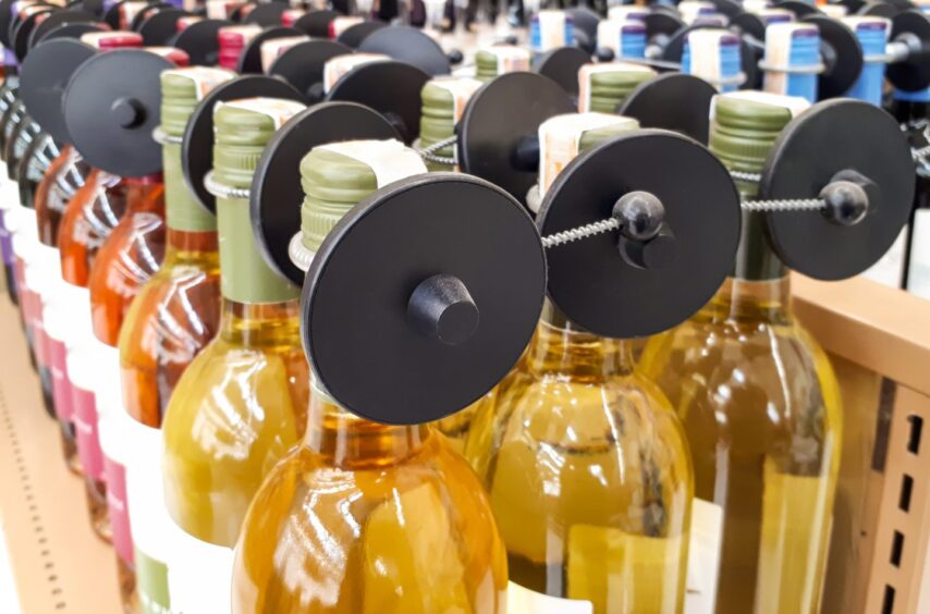 Wine bottles with security tags