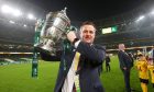 Jon Daly shows off the FAI Cup following St Patrick's Athletic's triuimph