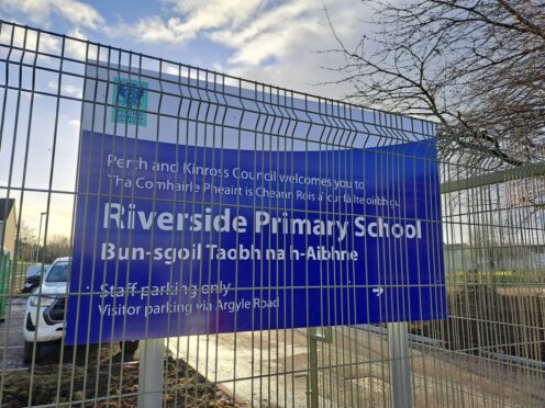 Sign for Riverside Primary with wrong spelling of Argyll Road.