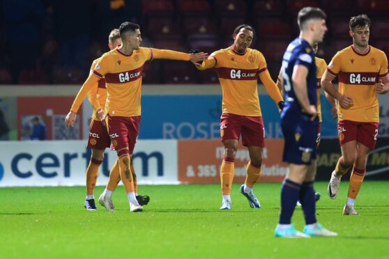 Motherwell celebrate making it 3-3, leaving Dundee gutted. Image: Shutterstock/David Young