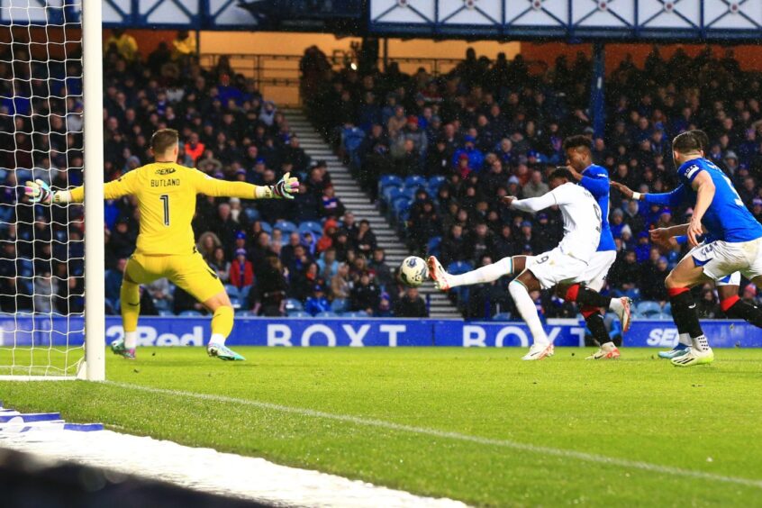 Amadou Bakayoko puts Dundee FC in the lead at Rangers. Image: Shutterstock