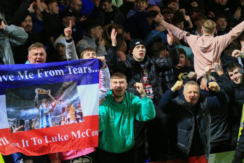 Dundee FC fans enjoyed their trip to Dingwall. Image: Shutterstock/David Young