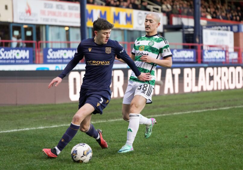 Dundee full-back Owen Beck on the ball against Celtic. Image: Shutterstock/David Young