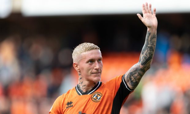 Craig Sibbald acknowledges the Dundee United fan