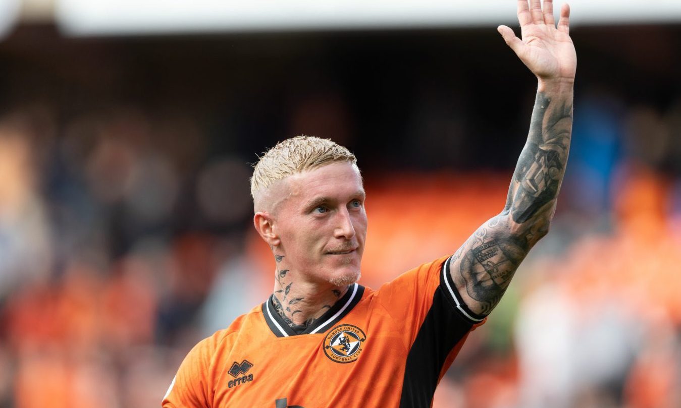 Craig Sibbald acknowledges the Dundee United fans.
