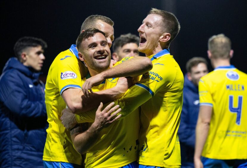  Raith players celebrate a win