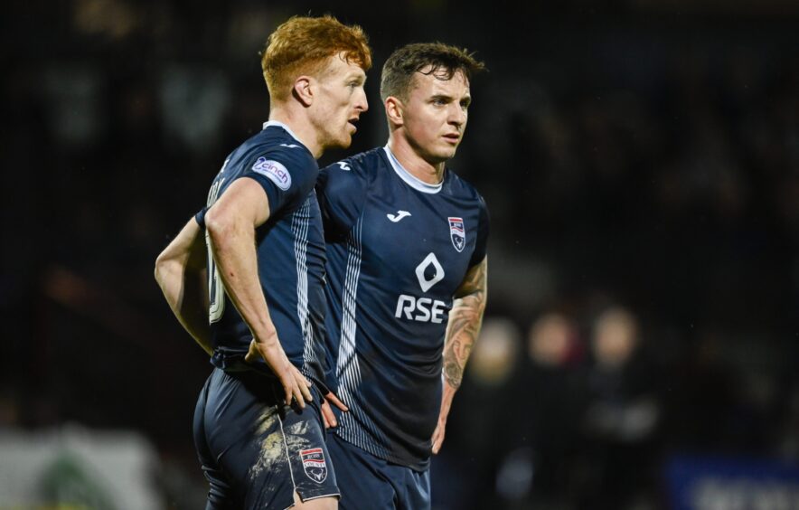 Scotland cap Eamonn Brophy stands with Ross County team-mate Simon Murray during the Premership clash with Dundee last month. Image: Rob Casey / SNS Group.