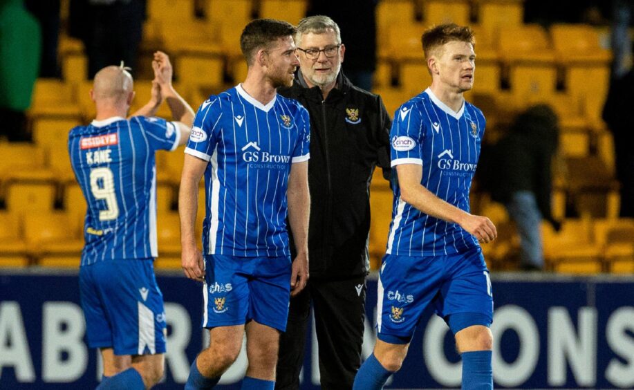 St Johnstone manager Craig Levein with his players at full-time.