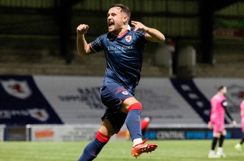 Lewis Vaughan leaps to celebrate scoring for Raith Rovers earlier in the season. Image: SNS.