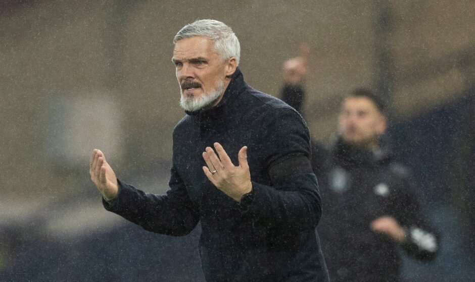 Dundee United boss Jim Goodwin on the touchline at Hampden