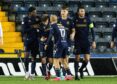 Dundee celebrate Joe Shaughnessy's (right) late header. Image: SNS
