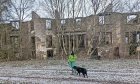 Gayle Ritchie explores abandoned Kincaldrum House in Angus - accompanied by her dog Toby.