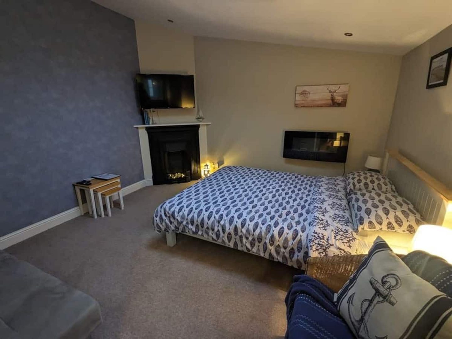 Spacious bedroom in the Barry Airbnb property.