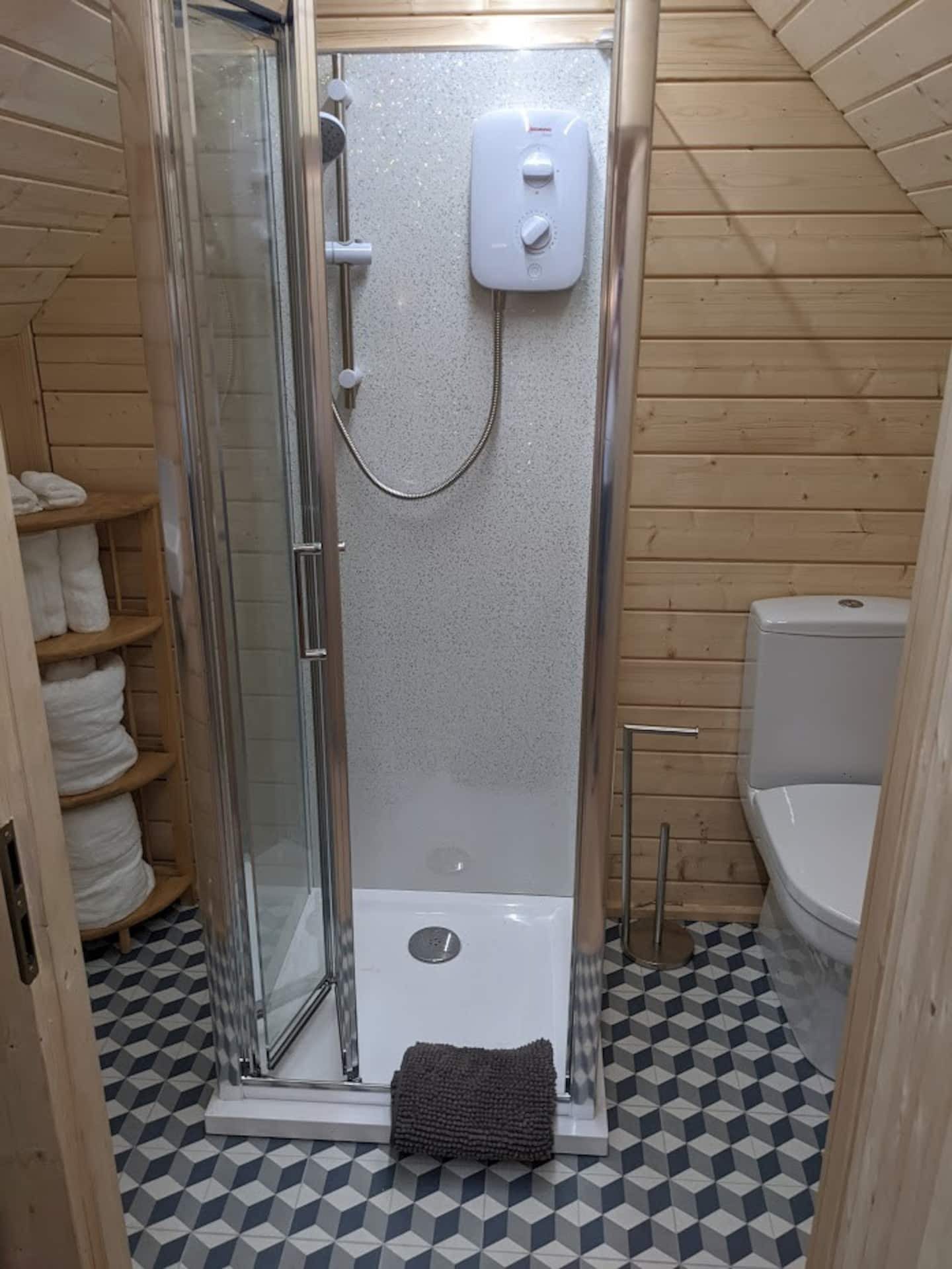 Electric shower at the Inverkeilor cabin.