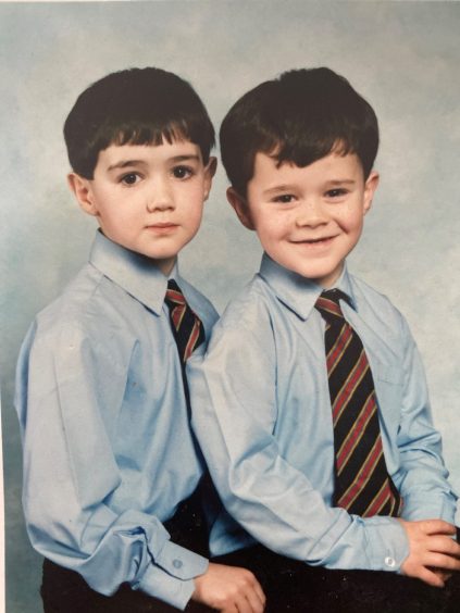 A school photo of Kyle Falconer, right, aged 7, with his brother Ronnie.