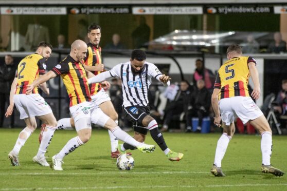Dunfermline Athletic striker Alex Jakubiak is surrounded by four Partick Thistle opponents. Image: Craig Brown / DAFC.