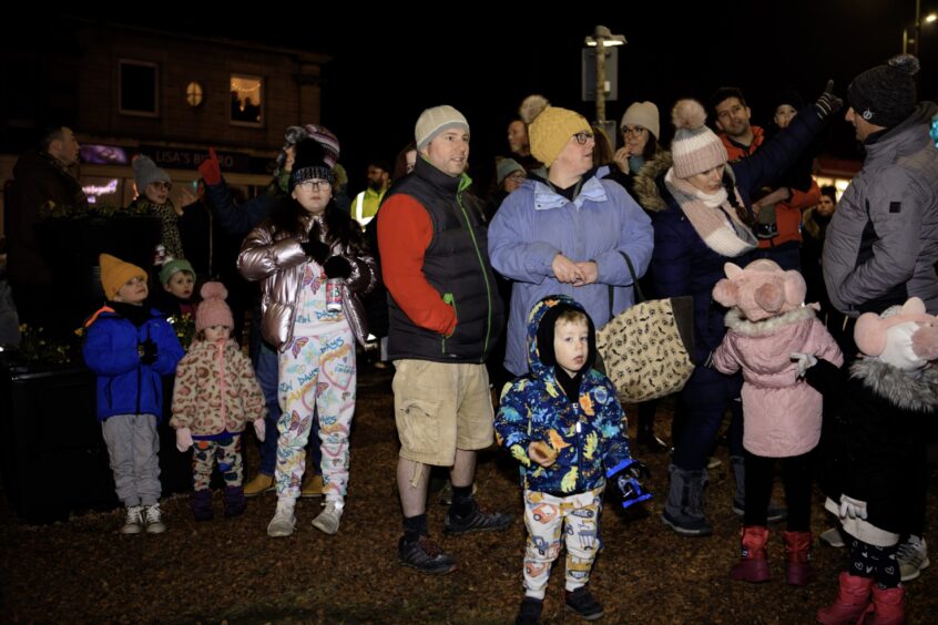Families at Craigie Cross for the Christmas lights switch on