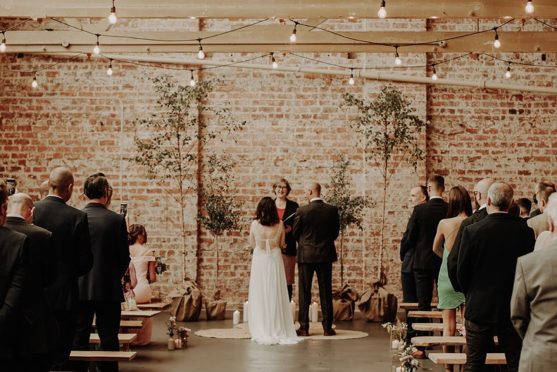 Couple getting married in The Weaving Shed