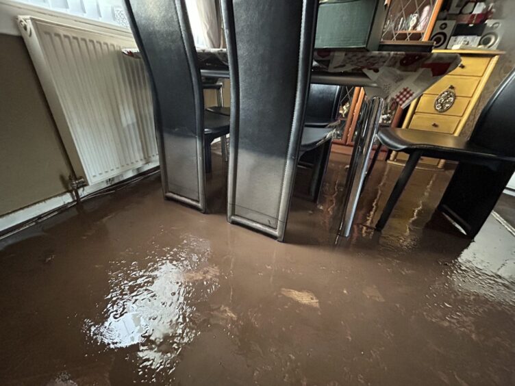 The mud-covered living room.