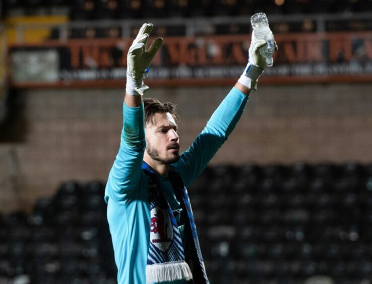Raith Rovers stopper Kevin Dabrowski conducts the celebrations at Dundee United