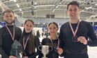 Dundee figure skaters (from left to right) Kyle Mcleod, Lucy Hay, Anastasia Vaipan Law and Luke Digby with their trophies and medals at the 2023 British Championships. Image: Ice Dundee