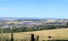 A montage showing how the solar farm will look from Forfar's Balmashanner Hill. Image: Relay Suttieside
