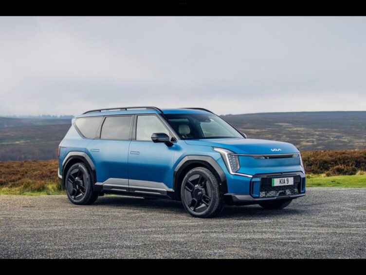 a blue Kia