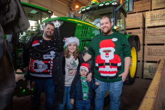 Left to right is Craig, Holly (9) Cameron (4) and Lee Balfour enjoying the day at Pluckerston Farm, Kirriemuir. Image: Kim Cessford / DC Thomson