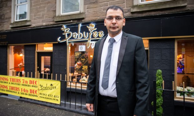 Nasir Hussain outside Babujee Indian restaurant in Perth Road, Dundee.