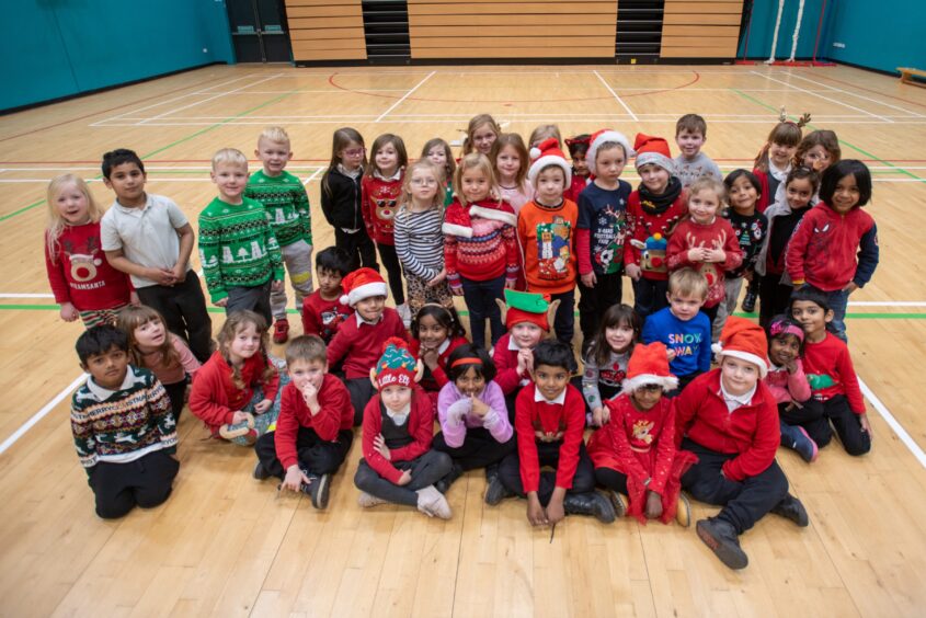 P1 youngsters in the school gym after completing the Inch View primary Santa run