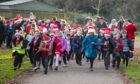 Inch View primary pupils in Santa hats running on Perth's South Inch
