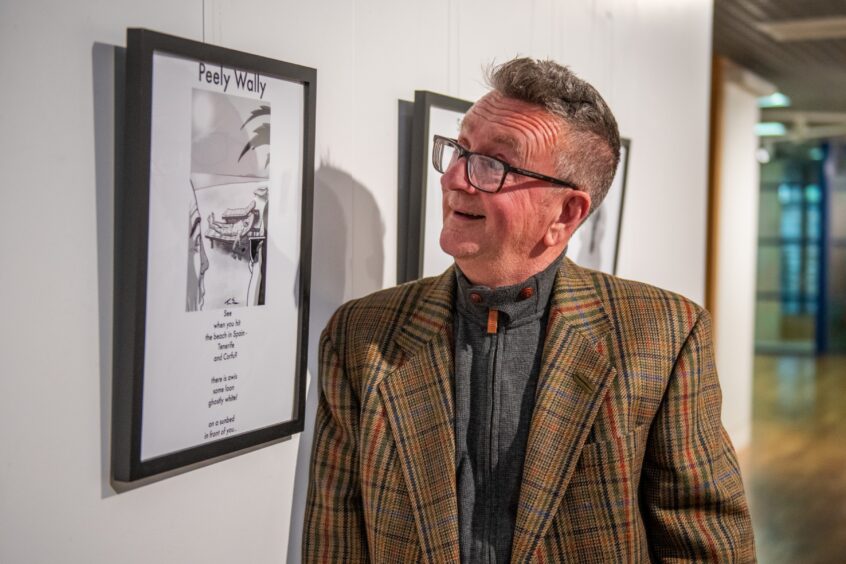 Ian Ferguson, with his 'Peely Wally' poem at the Michty Me exhibition in Rothes Halls.