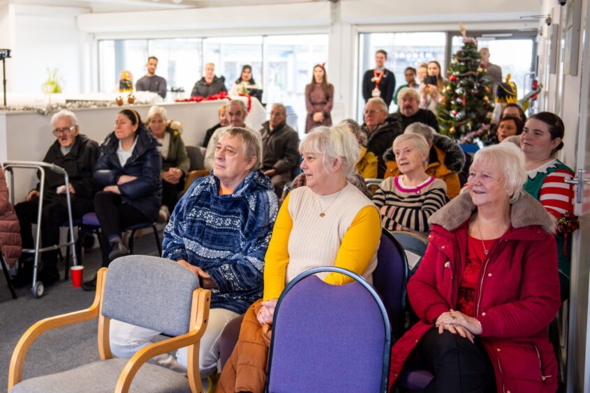 The audience, which included patients, enjoyed the choir singing at the lunchtime concert