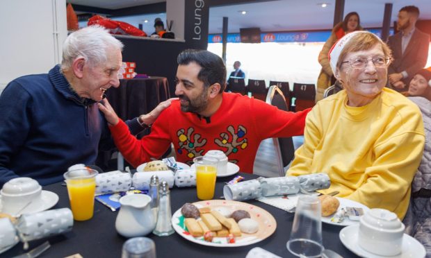 Humza Yousaf with Jacky Meldrum (left) and Moira Falconer at the Festive Friends event. Image: Kenny Smith/DC Thomson