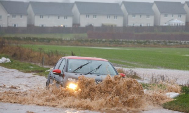 Flooding at Huntingtower on the A85 Perth to Crieff Road during Storm Gerrit