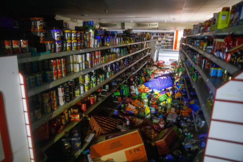 The devastation inside Ali's Discount Superstore following the December flood.